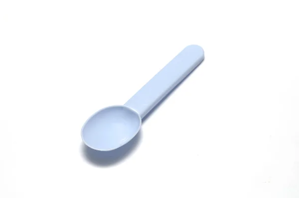 Blue plastic spoon — Stock Photo, Image