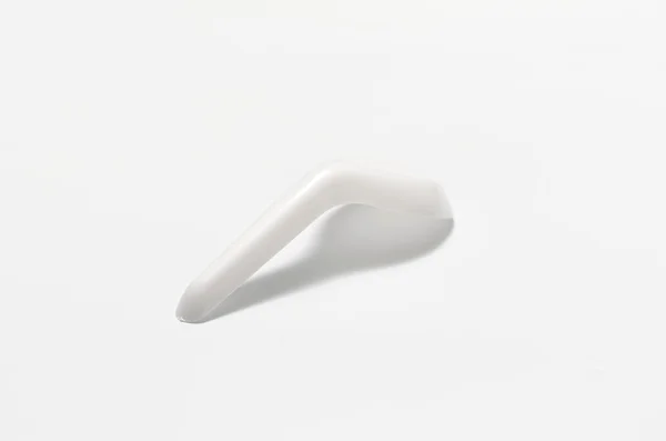 White plastic spoon — Stock Photo, Image