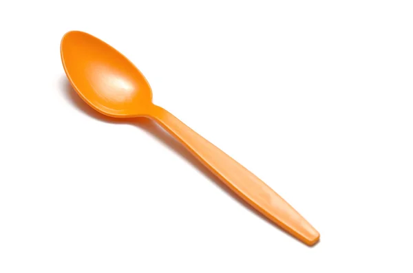 Orangefarbener Plastiklöffel — Stockfoto