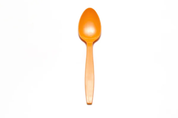 Oranžová plastová lžíce — Stock fotografie