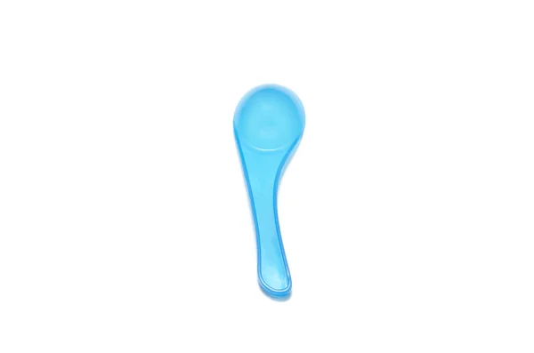 Синяя пластиковая ложка — стоковое фото