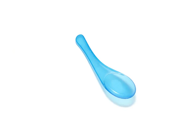 Blue plastic spoon — Stock Photo, Image