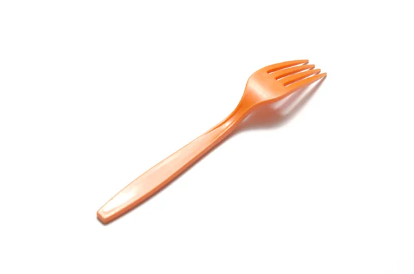 Orange plastic fork — Stock Photo, Image