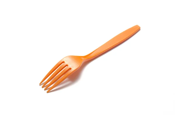 Orange plastic fork — Stock Photo, Image