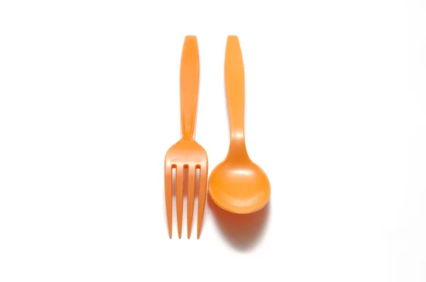 Cuillère et fourchette en plastique orange — Photo