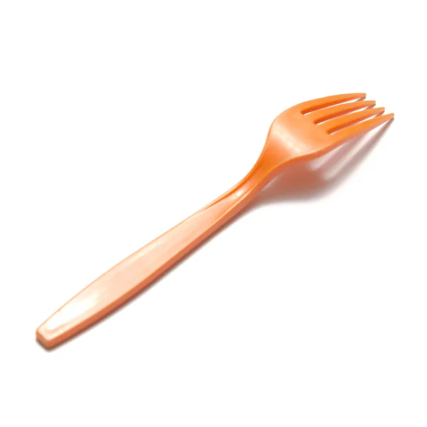 Oranje plastic vork — Stockfoto