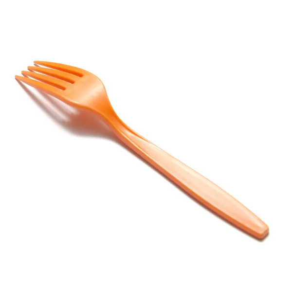 Oranje plastic vork — Stockfoto