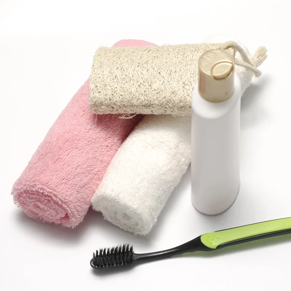 Toalla esponja jabón líquido y cepillo de dientes —  Fotos de Stock