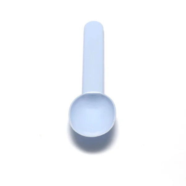 Blue plastic spoon — Stock Photo, Image