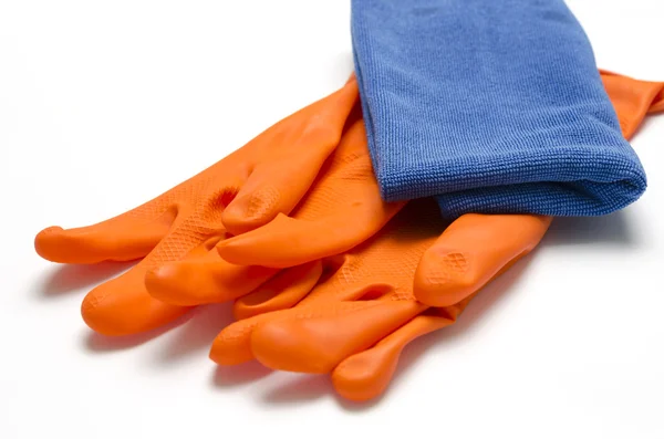 Blauwe lap met Oranje handschoen schoonmaken — Stockfoto