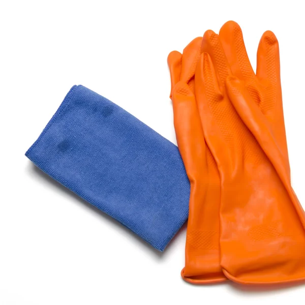 Blauwe lap met oranje schoonmaken handschoenen — Stockfoto