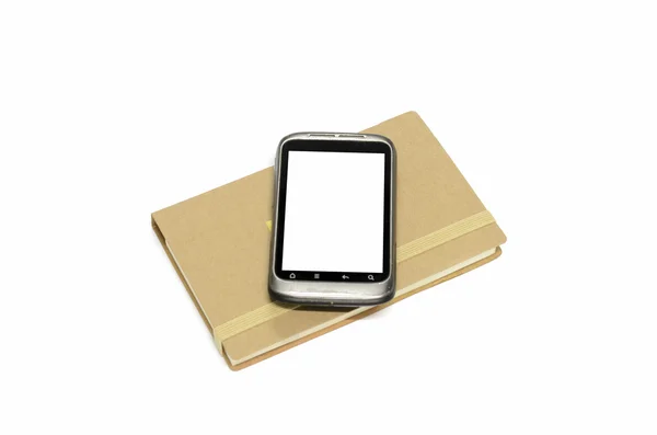Используемый смартфон с записной книжкой — стоковое фото