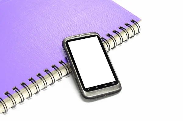 Smartphone met grijze Opmerking boek gebruikt — Stockfoto