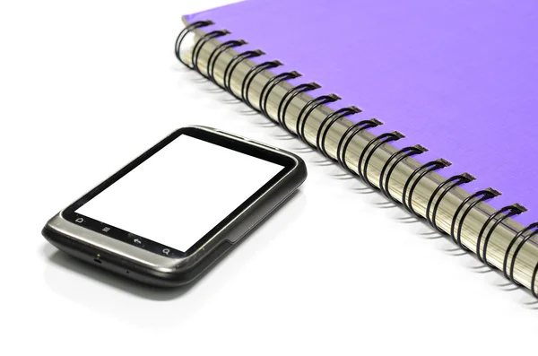 Used smartphone with grey note book — Stock Photo, Image