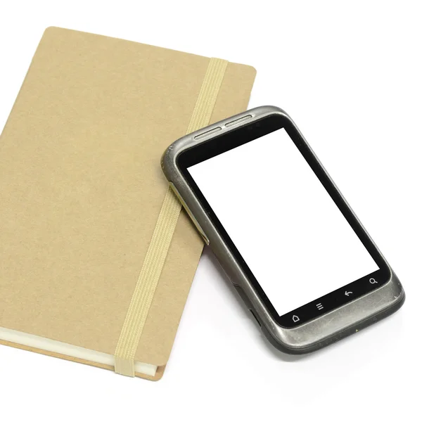 Smartphone no caderno. — Fotografia de Stock