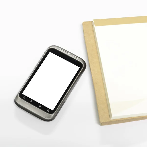 Smartphone on note book — Stock Photo, Image