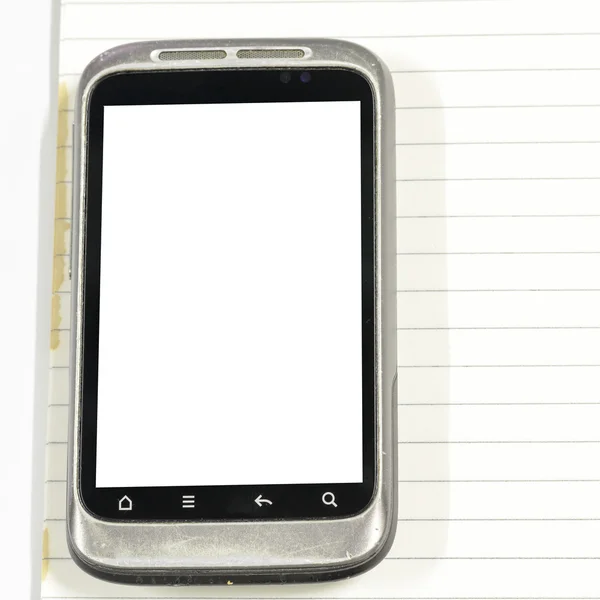 Smartphone avec carnet de notes — Photo