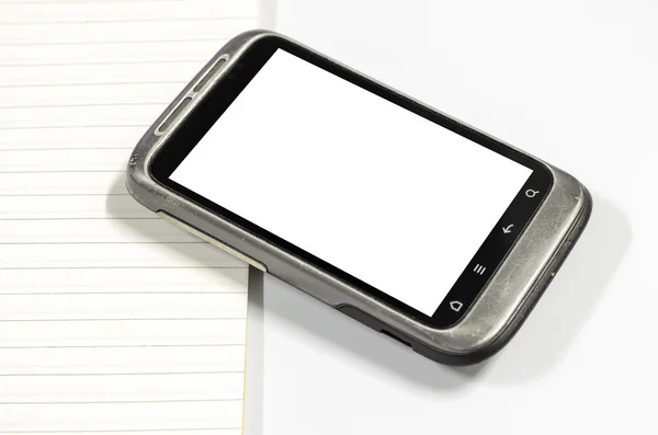 Smartphone med anteckningsbok — Stockfoto