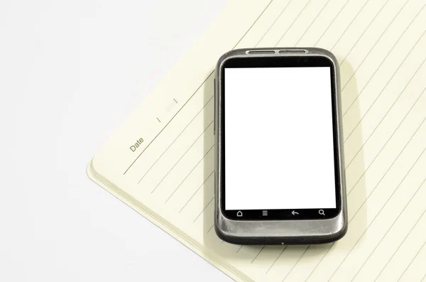 Smartphone avec carnet de notes — Photo