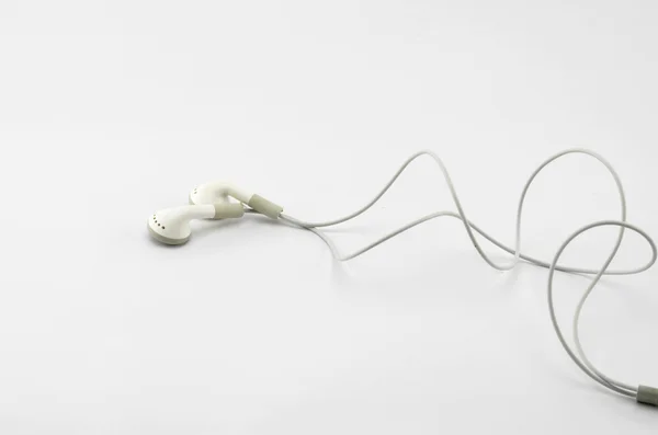 Bílá sluchátka — Stock fotografie