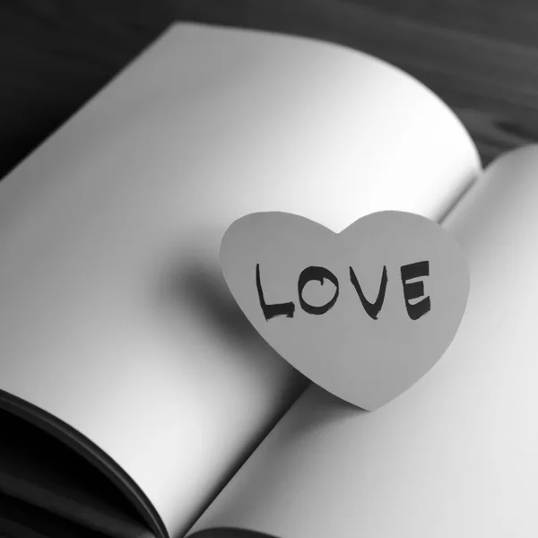 Black and white paper heart with notebook — Stock Photo, Image