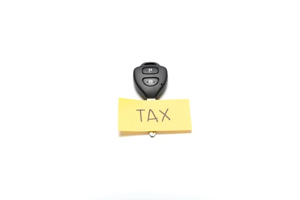 Автомобільний ключ з податком — стокове фото