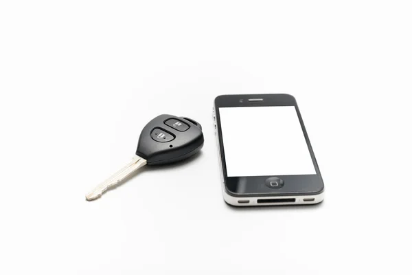 Klíč od auta s smartphone — Stock fotografie