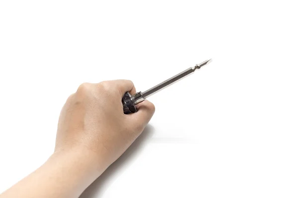 Left hand holding screwdriver — Stock Photo, Image