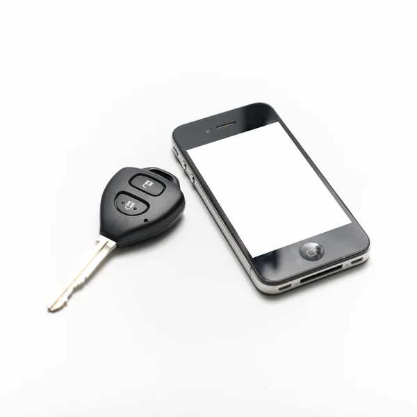 Chiave auto con smartphone — Foto Stock