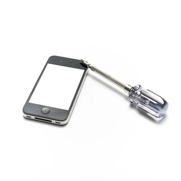 Black  smartphone with screwdriver — Stock Photo, Image