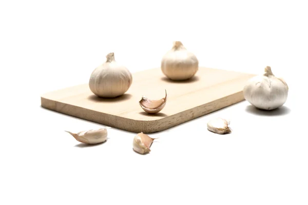 Knoblauch am Schneidebrett — Stockfoto