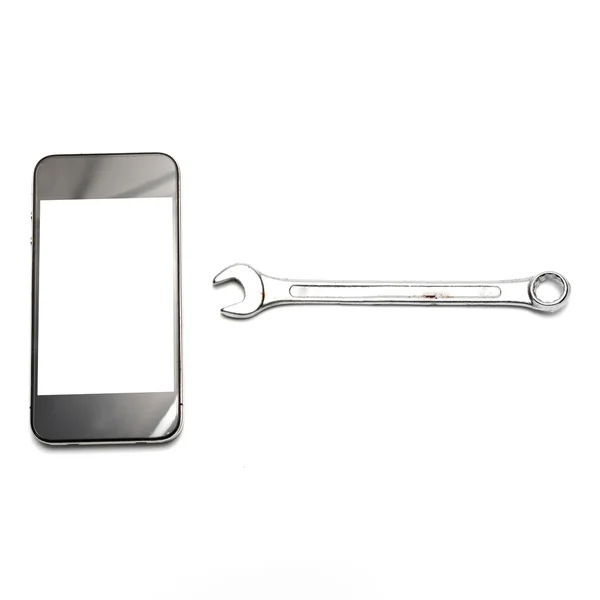 Smartphone with steel  wrench — Stock Photo, Image