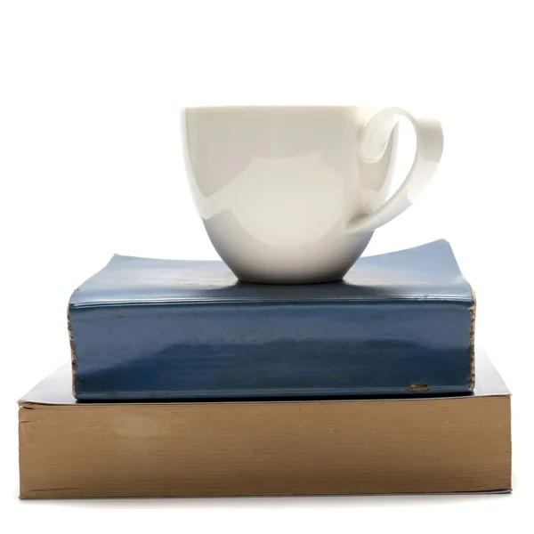 yığın kitap ve kahve Kupası