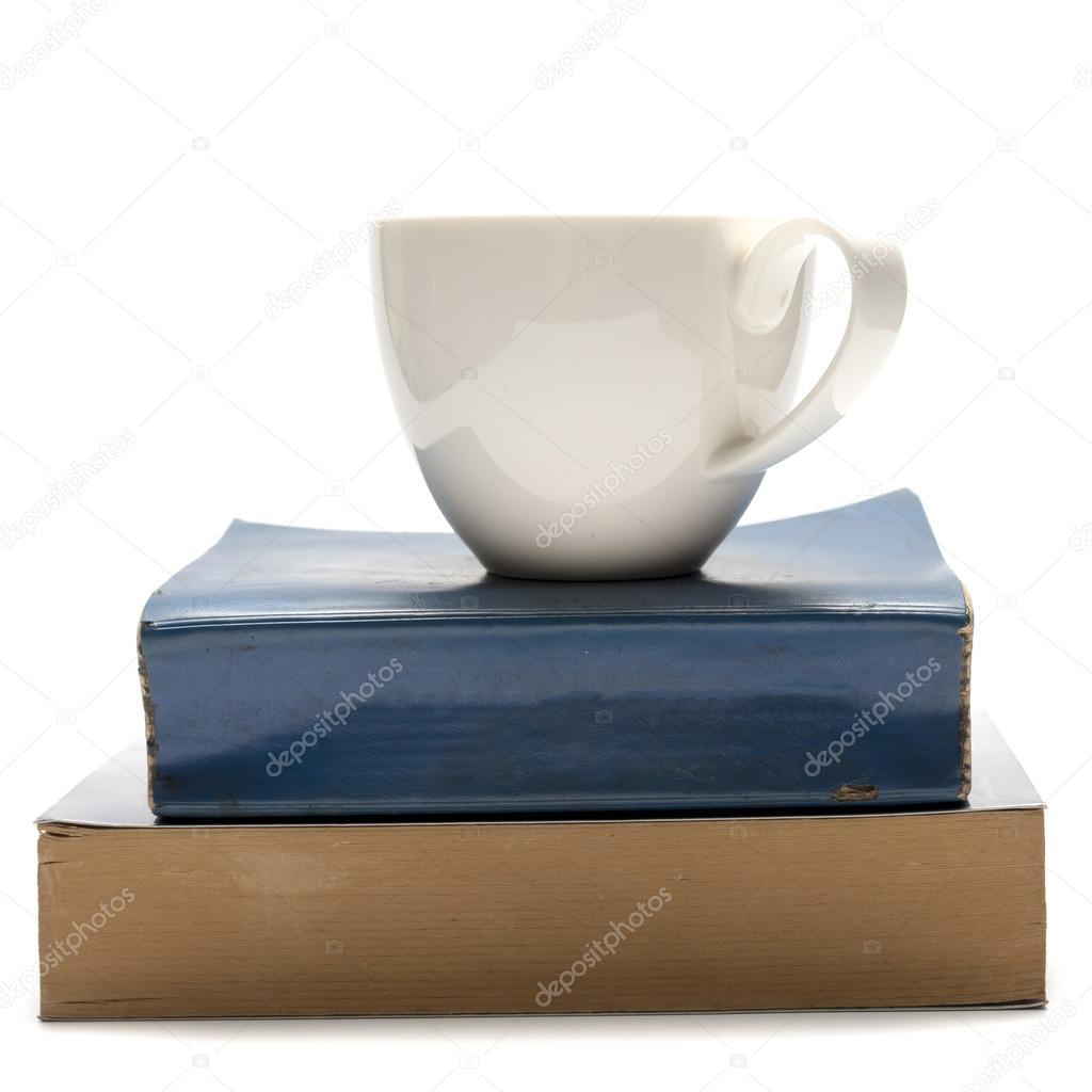 stack of book and coffee cup