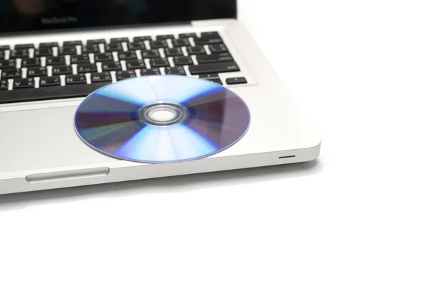 DVD schotel op laptop — Stockfoto