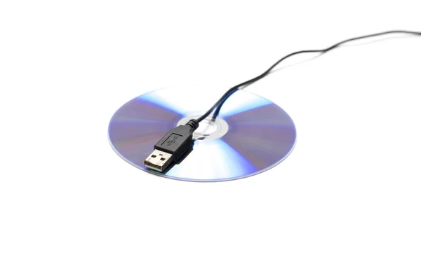 Usb cable on dvd dish — Stock Photo, Image