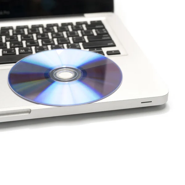 DVD schotel op laptop — Stockfoto