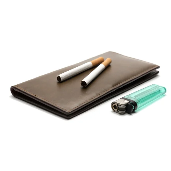 Cigarette on wallet and lighter — Stock Photo, Image