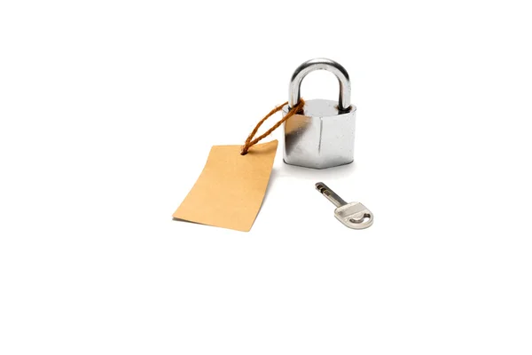 Padlock and key with tag — Stock Photo, Image