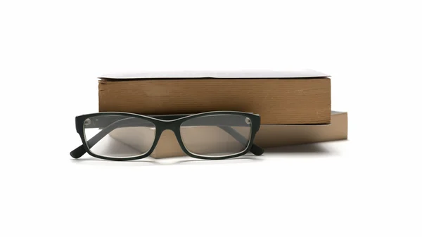 Apilar og libro y gafas —  Fotos de Stock