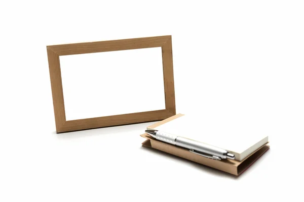 Wood photo frame ams notebook with pen — Stock Photo, Image