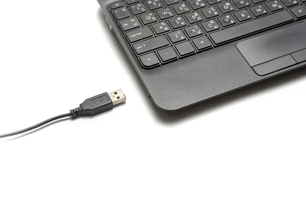 Usb kabel a notebook — Stock fotografie