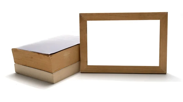 Stack of book with wood photo frame — Stock Photo, Image