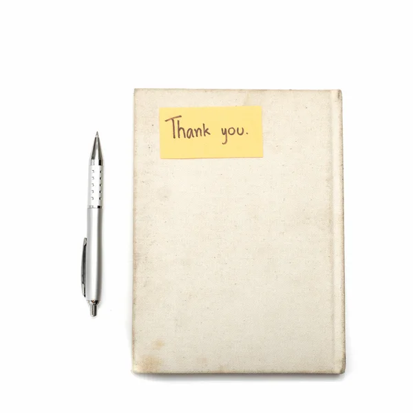Obrigado cartão no caderno e caneta — Fotografia de Stock