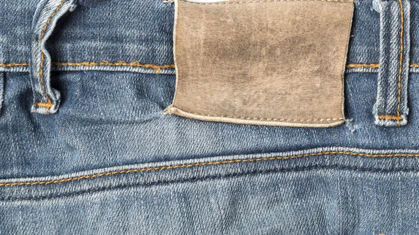 Etikett på jean byxor — Stockfoto