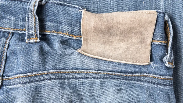 Aufkleber auf Jeanshosen — Stockfoto
