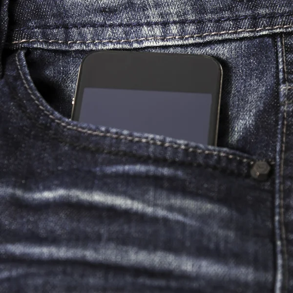 Smartphone en jean — Foto de Stock