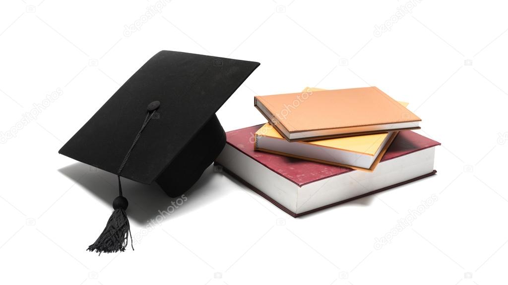 graduation cap and book