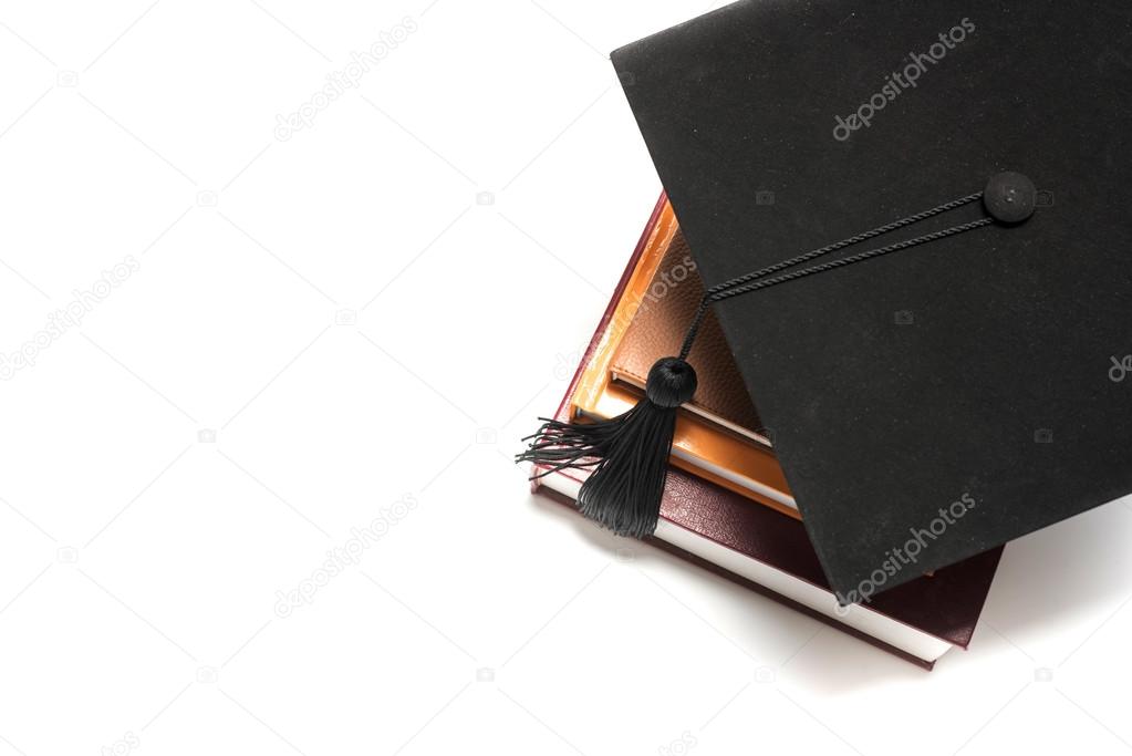 graduation cap and book