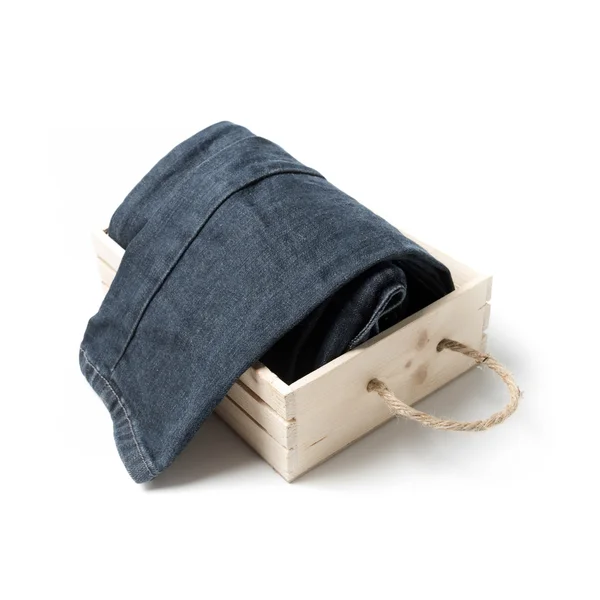 Jean en caja de madera — Foto de Stock